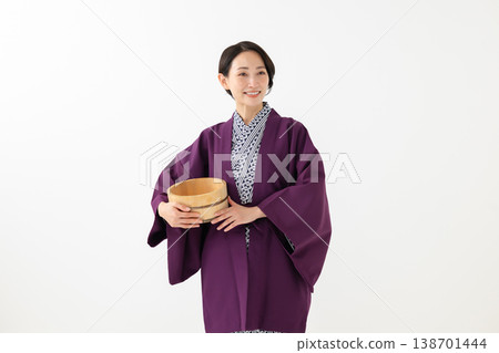 A woman in a yukata A woman in a yukata 138701444