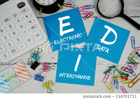 EDI Electronic Data Interchange text phrase of business and financial concept EDI Electronic Data Interchange text phrase of business and financial concept 138701711
