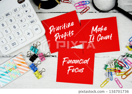 Prioritize Profits, Make It Count, Financial Focus text written on paper note with calculator and magnifying glass on wooden background Prioritize Profits, Make It Count, Financial Focus text written on paper note with calculator and magnifying glass on wooden background 138701736