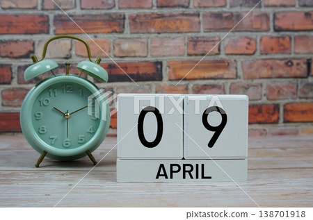 Wooden Calendar Showing the Date of April 9th. Day 9 of April month 138701918