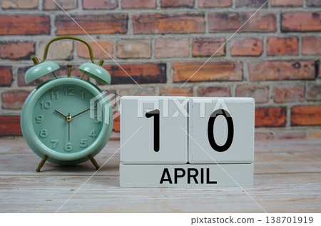 Wooden Calendar Showing the Date of April 10th. Day 10 of April month 138701919