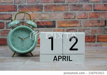 Wooden Calendar Showing the Date of April 12th. Day 12 of April month Wooden Calendar Showing the Date of April 12th. Day 12 of April month 138701921