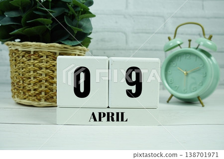 Wooden Calendar Showing the Date of April 9th. Day 9 of April month Wooden Calendar Showing the Date of April 9th. Day 9 of April month 138701971