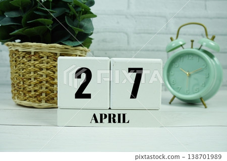 Wooden Calendar Showing the Date of April 27th. Day 27 of April month 138701989