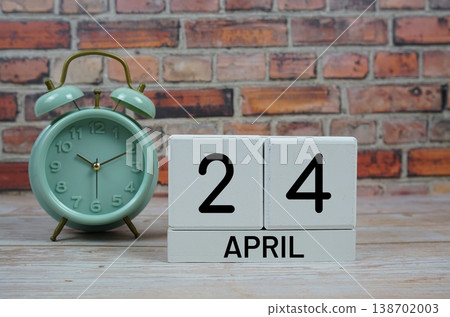 Wooden Calendar Showing the Date of April 24th. Day 24 of April month Wooden Calendar Showing the Date of April 24th. Day 24 of April month 138702003