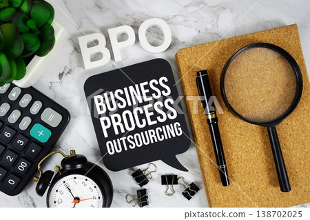 BPO - Business Process Outsourcing acronym with calculator, alarm clock and magnifying glass, business concept background 138702025