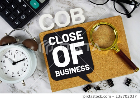 COB - Close Of Business acronym with calculator, alarm clock and magnifying glass, Business concept background 138702037