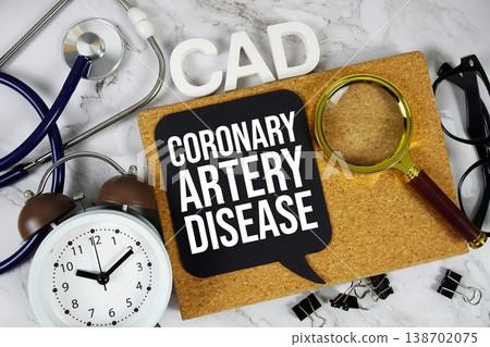 CAD - Coronary Artery Disease acronym with stethoscope, alarm clock and magnifying glass, medical and healthcare concept background CAD - Coronary Artery Disease acronym with stethoscope, alarm clock and magnifying glass, medical and healthcare concept background 138702075