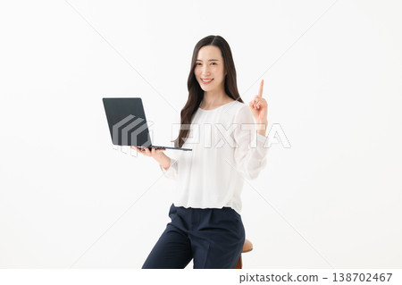 A woman with a laptop A woman with a laptop 138702467