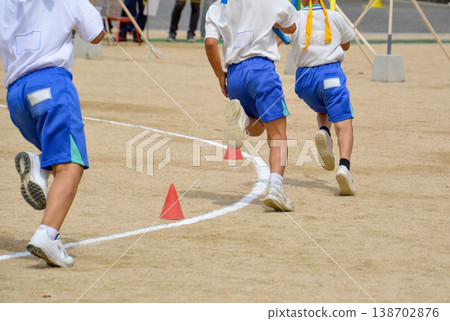 Elementary school student running at athletic meet 138702876