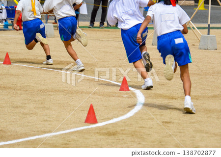 Elementary school student running at athletic meet Elementary school student running at athletic meet 138702877