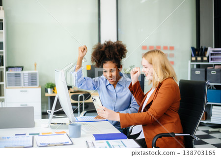 Female discussing new project with male colleague. Young woman talking 138703165