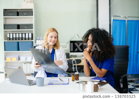 Medical, meeting and doctors with laptop for research, planning and hospital schedule management. 138703325