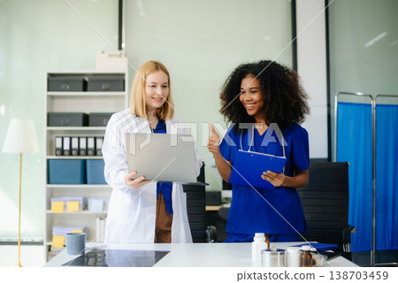 Medical, meeting and doctors with laptop for research, planning and hospital schedule management. Medical, meeting and doctors with laptop for research, planning and hospital schedule management. 138703459