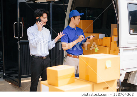 Asian Courier Delivering Package to man Delivery service near van outside the warehouse, delivery home 138704368
