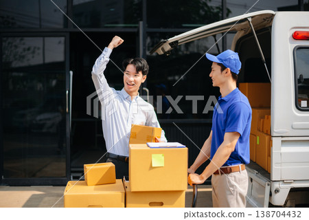 Delivery Asian man by sending box of parcel to customers service at home Delivery Asian man by sending box of parcel to customers service at home 138704432