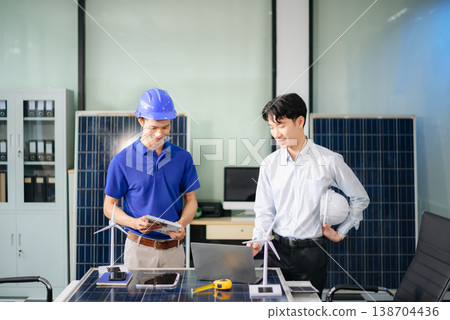 Engineer Team Meeting of Sustainable on a solar and wind energy project, discussing innovation Engineer Team Meeting of Sustainable on a solar and wind energy project, discussing innovation 138704436