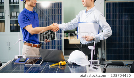 Engineer Team Meeting of Sustainable on a solar and wind energy project, discussing innovation Engineer Team Meeting of Sustainable on a solar and wind energy project, discussing innovation 138704450