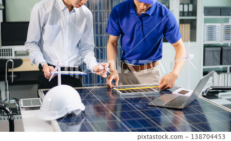 Engineer Team Meeting of Sustainable on a solar and wind energy project, discussing innovation Engineer Team Meeting of Sustainable on a solar and wind energy project, discussing innovation 138704453
