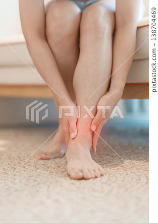 woman having leg pain due to Ankle Sprains or Achilles Tendonitis and Shin Splints ache. injury, hyperuricemia disease and Gout. Health care and medical treatment concepts woman having leg pain due to Ankle Sprains or Achilles Tendonitis and Shin Splints ache. injury, hyperuricemia disease and Gout. Health care and medical treatment concepts 138704469