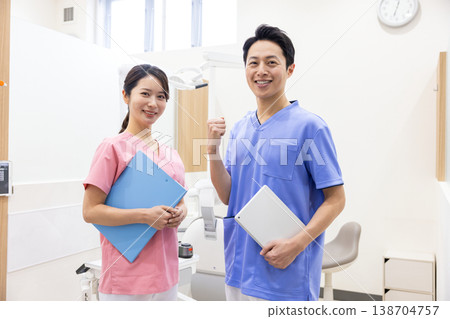 Dental examination room: Portrait of a dentist Dental examination room: Portrait of a dentist 138704757