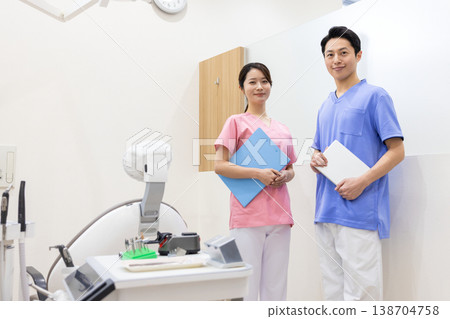 Dental examination room: Portrait of a dentist Dental examination room: Portrait of a dentist 138704758