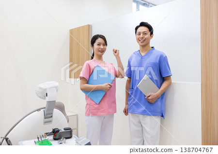 Dental examination room: Portrait of a dentist Dental examination room: Portrait of a dentist 138704767