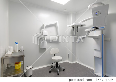 Modern Dental X-Ray Room with Panoramic Tomography Machine 138704886