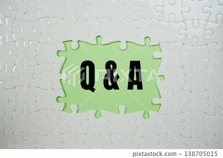 Jigsaw puzzle with a missing piece with "Q&A" on green background Jigsaw puzzle with a missing piece with "Q&A" on green background 138705015