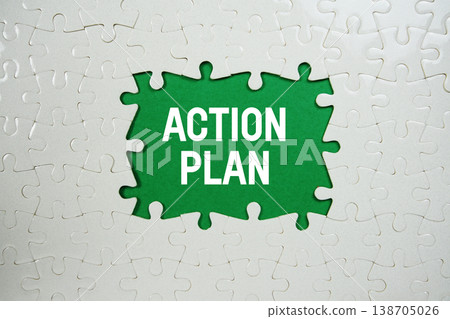 Jigsaw puzzle with a missing piece with "Action Plan" on green background Jigsaw puzzle with a missing piece with "Action Plan" on green background 138705026