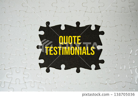 Jigsaw puzzle with a missing piece with "Quote Testimonials" on black background 138705036