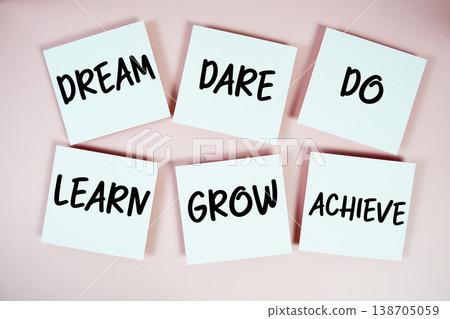 Dream, Dare, Do, Learn, Grow, Achieve message written on paper notes Motivation concept Dream, Dare, Do, Learn, Grow, Achieve message written on paper notes Motivation concept 138705059