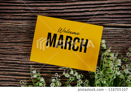 Welcome March text written on paper card with flower decorations Welcome March text written on paper card with flower decorations 138705107