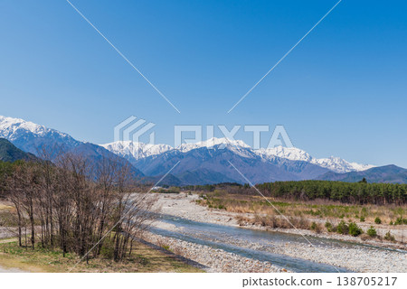 The snow-capped Northern Alps and the Takase River The snow-capped Northern Alps and the Takase River 138705217