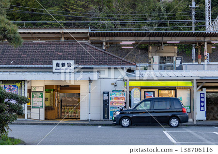 A taxi parked in front of Manazuru Station (a scene from a local train station) 138706116