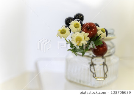 Artificial flowers decorating the table 138706689