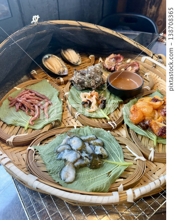 A set of shellfish sashimi, perfect as a snack to accompany alcoholic beverages, from Busan, South Korea. A set of shellfish sashimi, perfect as a snack to accompany alcoholic beverages, from Busan, South Korea. 138708365