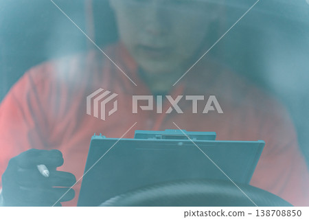 A light van and a man in overalls 138708850