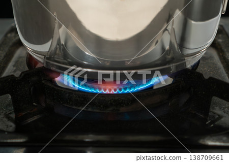 An orange flame on a gas stove typically indicates incomplete combustion, due to an improper air-to-fuel mixture or clogged burners. An orange flame on a gas stove typically indicates incomplete combustion, due to an improper air-to-fuel mixture or clogged burners. 138709661