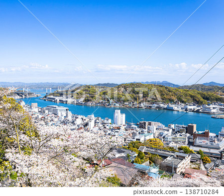 A view of Onomichi city from the area around Senkoji Temple in Onomichi City, Hiroshima Prefecture, during a tranquil spring when cherry blossoms are in bloom. 138710284