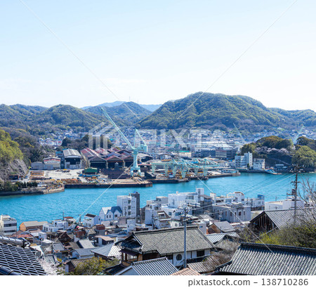 A view of Onomichi city from the area around Senkoji Temple in Onomichi City, Hiroshima Prefecture, during a tranquil spring when cherry blossoms are in bloom. A view of Onomichi city from the area around Senkoji Temple in Onomichi City, Hiroshima Prefecture, during a tranquil spring when cherry blossoms are in bloom. 138710286