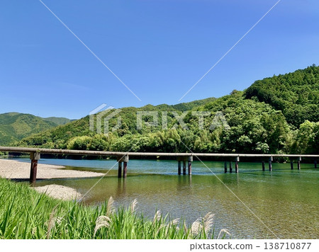 Shimanto River and Takase Submerged Bridge, decorated with the clear blue sky and fresh greenery of May (Shimanto City, Kochi Prefecture) Shimanto River and Takase Submerged Bridge, decorated with the clear blue sky and fresh greenery of May (Shimanto City, Kochi Prefecture) 138710877
