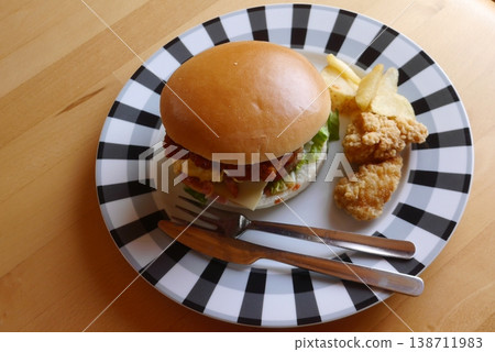 A large hamburger (photographed from above) A large hamburger (photographed from above) 138711983