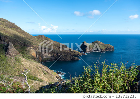 Cliffs and coastline of Taiohae Bay in Nuku Hiva, Marquesas Islands, French Polynesia Cliffs and coastline of Taiohae Bay in Nuku Hiva, Marquesas Islands, French Polynesia 138712233