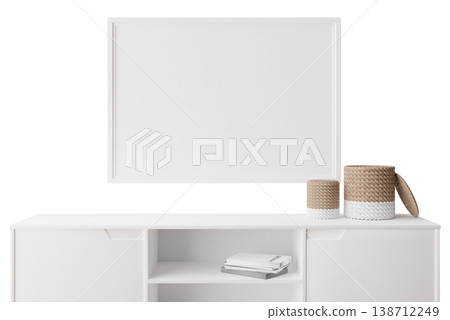 This setup features a white sideboard with storage spaces and a minimalist picture frame above. There are decorative items on the sideboard and books nearby 138712249