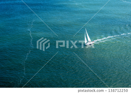 Sailboat gliding through the bay near Golden Gate Bridge, San Francisco Sailboat gliding through the bay near Golden Gate Bridge, San Francisco 138712250