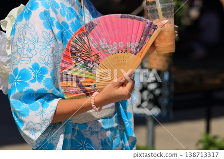A woman caught in a fan 138713317
