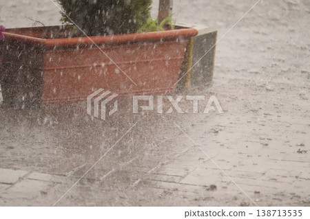 Parking lot in a torrential downpour - 2 138713535