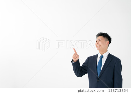 Young male business pointing Young male business pointing 138713864