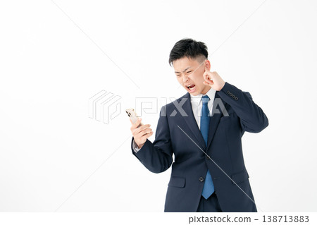 Young male business smartphone stress Young male business smartphone stress 138713883
